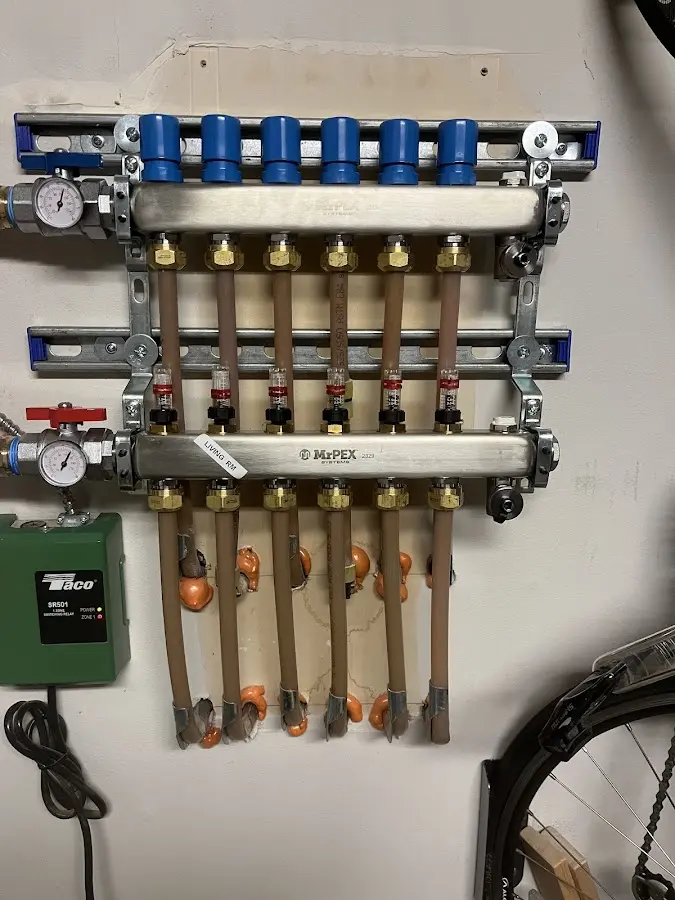 Plumber performing Water Heater Repair at a residential property in Merced